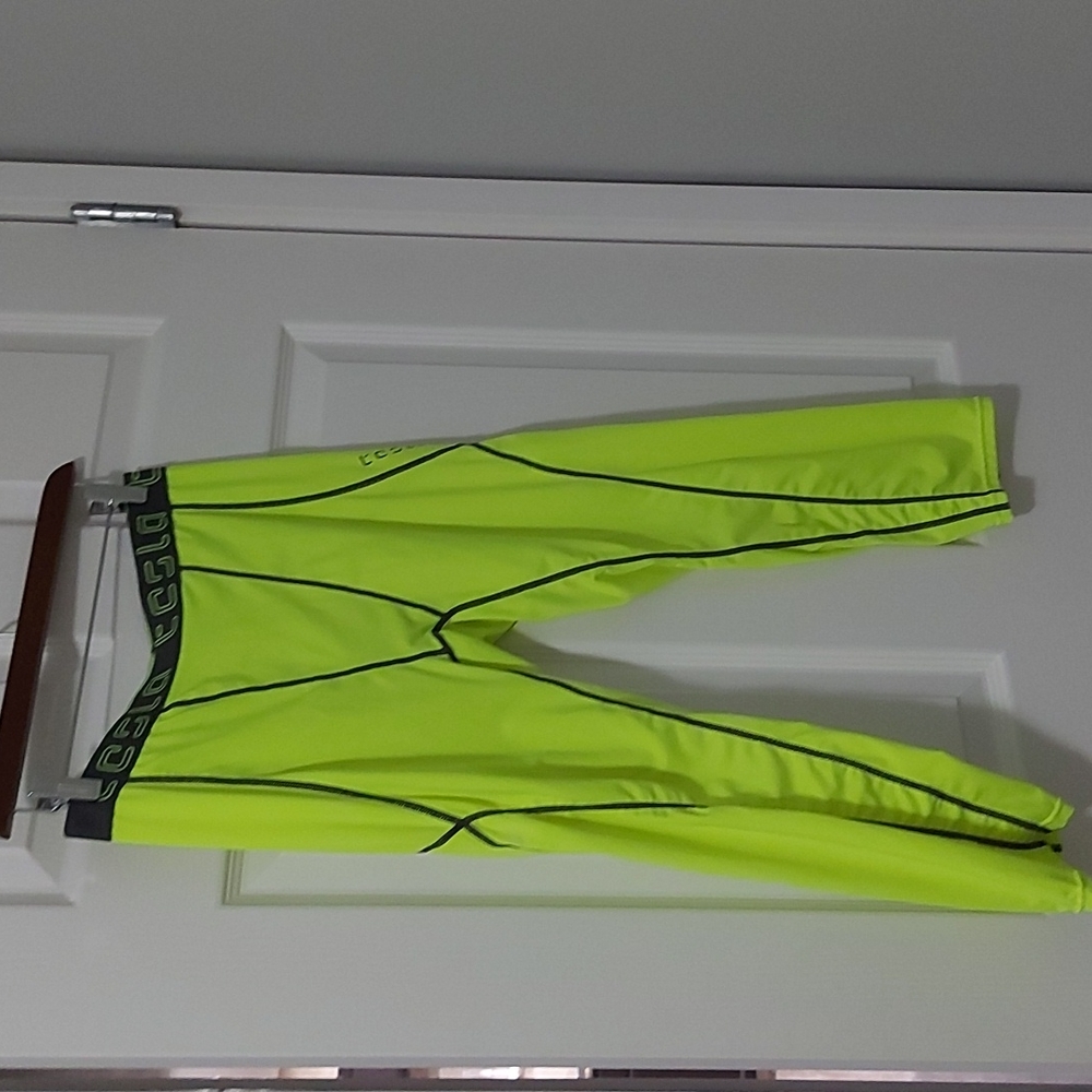 Tesla MUC18 3/4 length compression pants in neon yellow